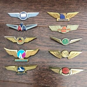Vintage plastic airline lapel wings collection. Includes Eastern and Continental